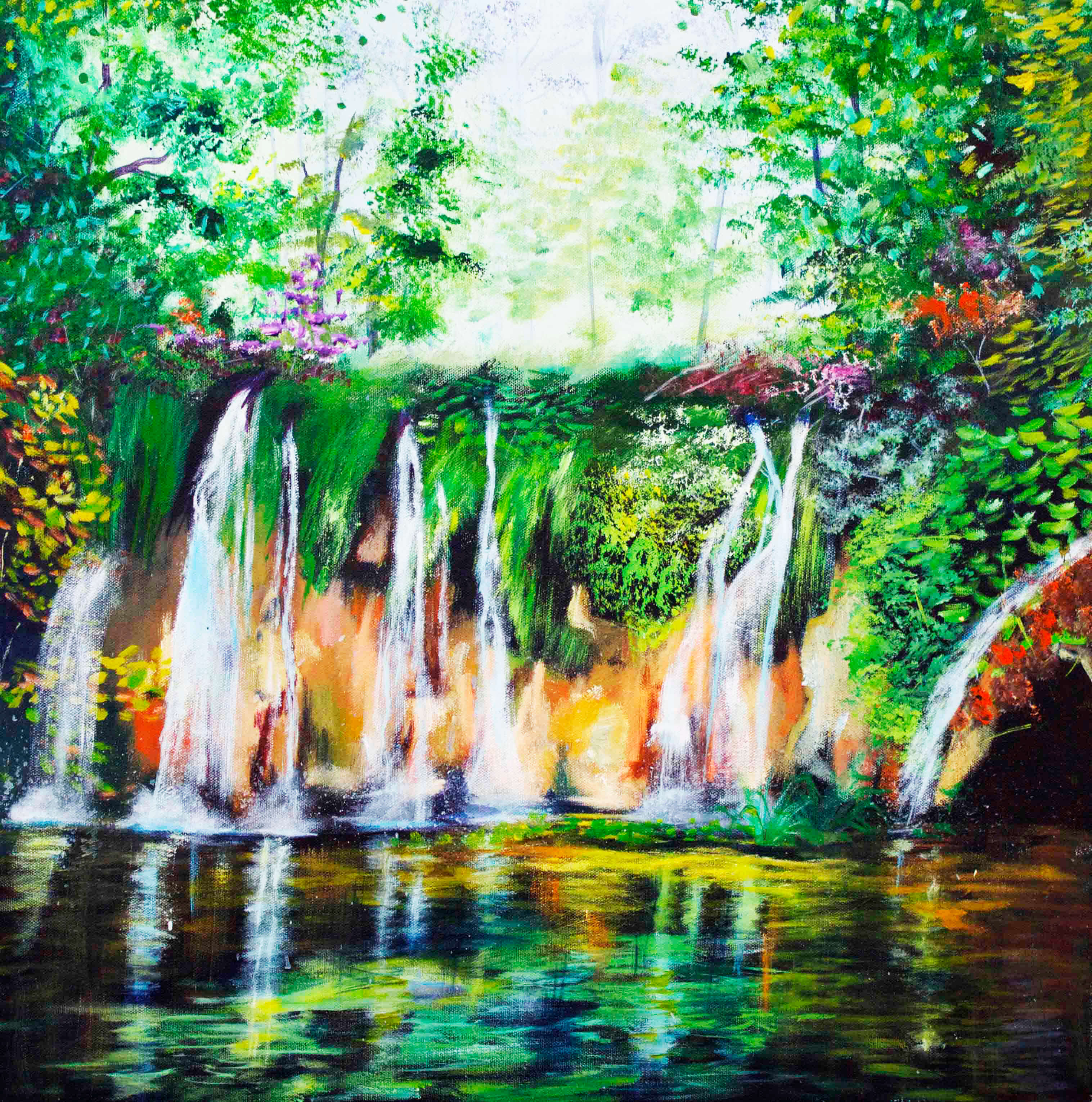 green landscape with waterfall